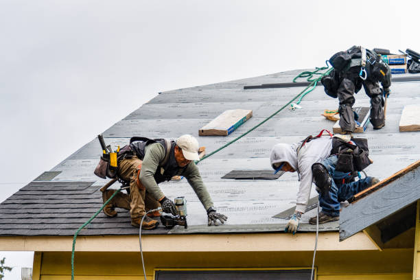 Professional Roofing technician working in Adelanto, CA